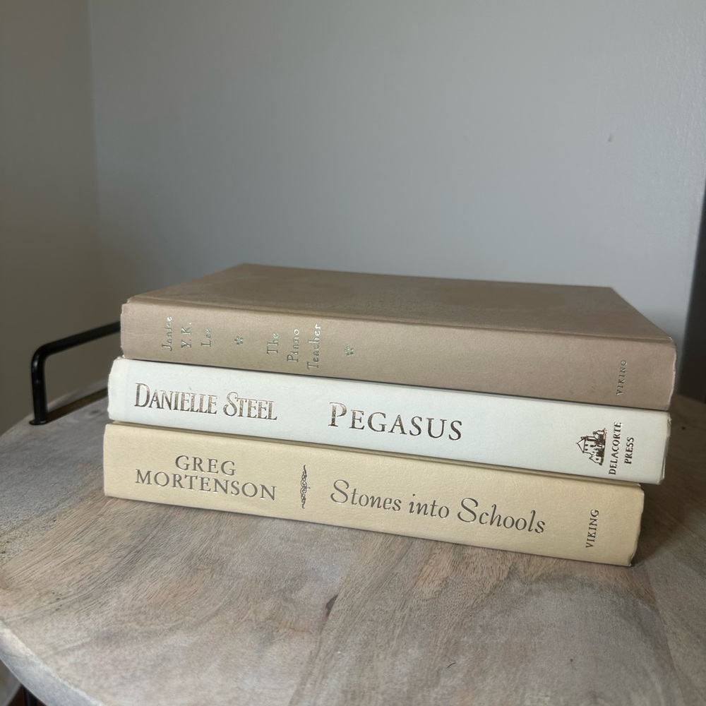 Tan and White Coffee Table Books Accent